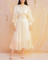 Flowy organza midi dress with puff sleeves and smocked waist for elegant movement